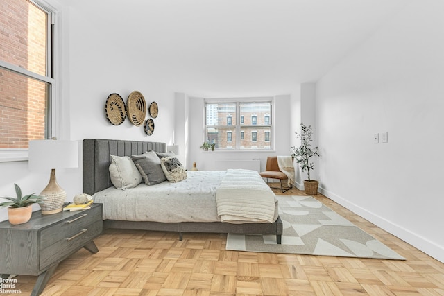 501 E 79th St Unit 5A, New York City, NY 10075 - bedroom featuring baseboards