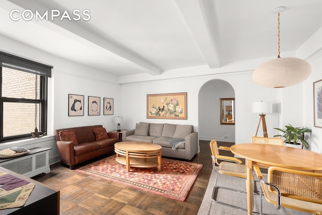 235 W End Ave Unit 8D, New York City, NY 10023 - living room with arched walkways and beamed ceiling