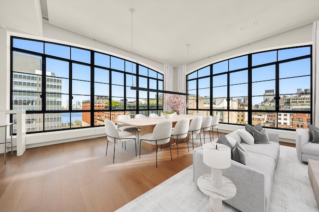 sunroom / solarium with a city view