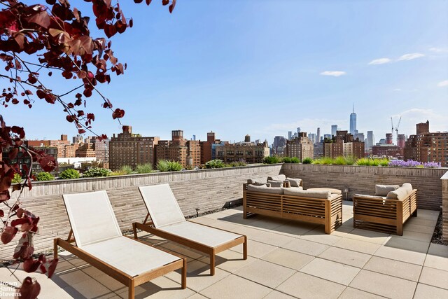 345 W 14th St Unit 8D, New York City, NY 10014 - view of patio with a skyline view and an outdoor living space