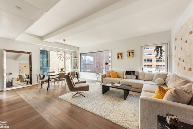 345 W 14th St Unit 8D, New York City, NY 10014 - living room featuring wood finished floors and beam ceiling