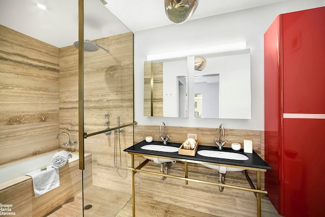 345 W 14th St Unit 8D, New York City, NY 10014 - bathroom featuring a stall shower, a bath, and double vanity