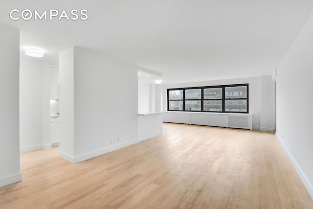205 W End Ave Unit 15H, New York City, NY 10023 - empty room with light wood-type flooring and baseboards
