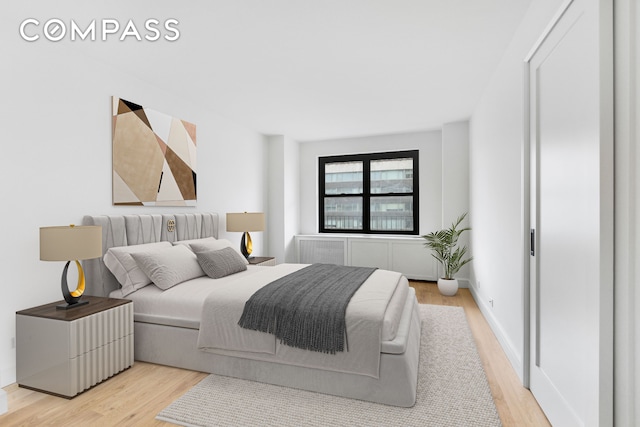 205 W End Ave Unit 15H, New York City, NY 10023 - bedroom with light wood-style flooring