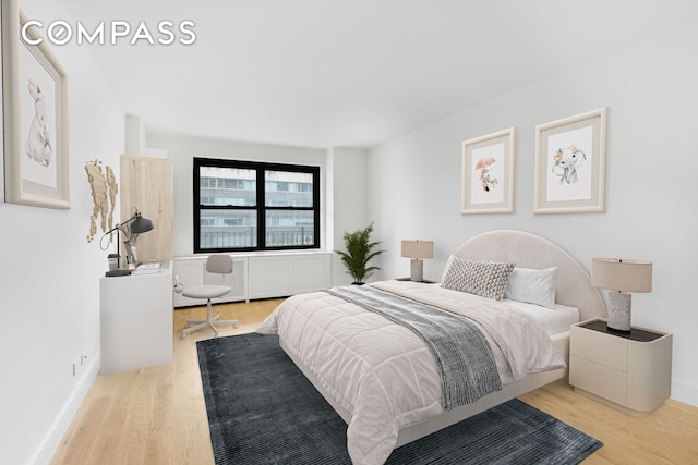 205 W End Ave Unit 15H, New York City, NY 10023 - bedroom featuring wood finished floors and baseboards