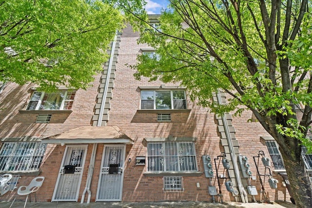 53 Woods Place, New York City, NY 11226 - view of front of property featuring brick siding