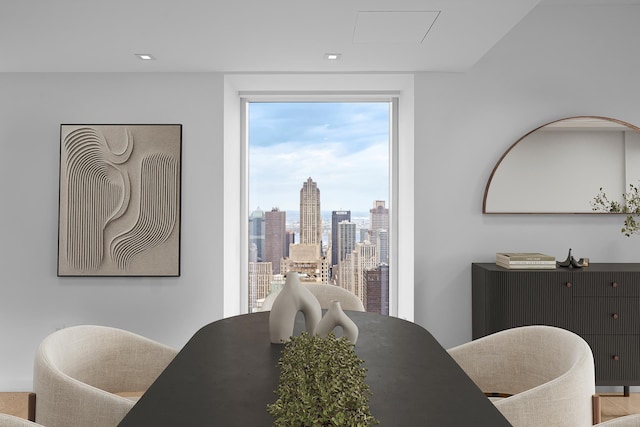 138 E 50th St Unit 68, New York City, NY 10022 - dining room featuring a view of skyline