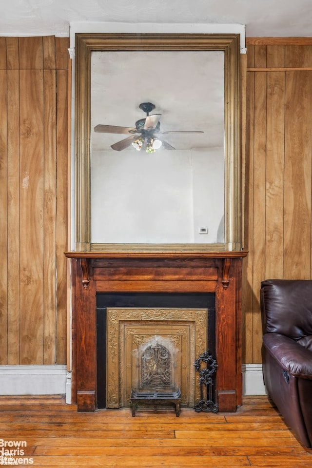 7 Sylvan Ct, New York City, NY 10035 - detailed view of wood finished floors, wooden walls, and a ceiling fan