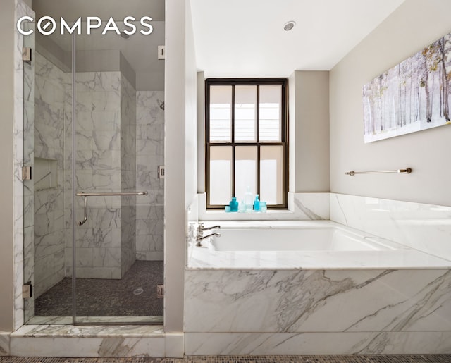 130 W 30th St Unit 3B, New York City, NY 10001 - full bathroom featuring a bath and a marble finish shower