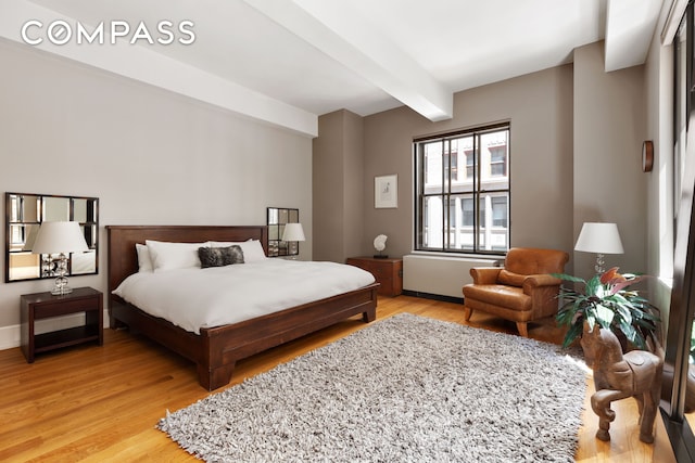 130 W 30th St Unit 3B, New York City, NY 10001 - bedroom featuring beam ceiling and light wood-type flooring
