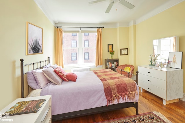 360 Riverside Dr Unit 8A, New York City, NY 10025 - bedroom with wood finished floors, crown molding, and ceiling fan