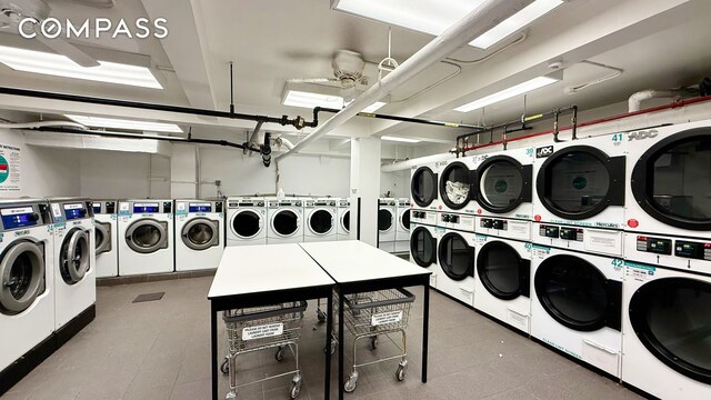 420 E 64th St Unit W4D, New York City, NY 10065 - shared laundry room with washing machine and clothes dryer and stacked washer and clothes dryer