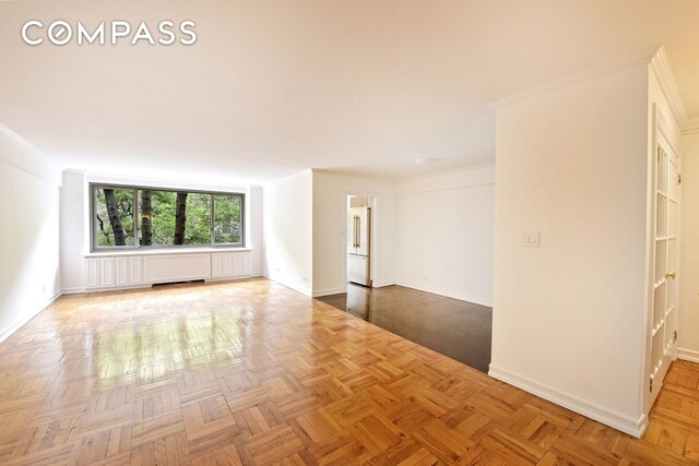 420 E 64th St Unit W4D, New York City, NY 10065 - unfurnished room featuring baseboards