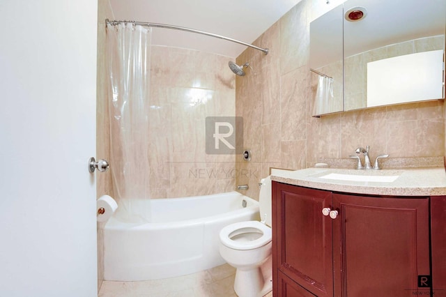 full bath featuring tile walls, shower / bath combination with curtain, vanity, and toilet