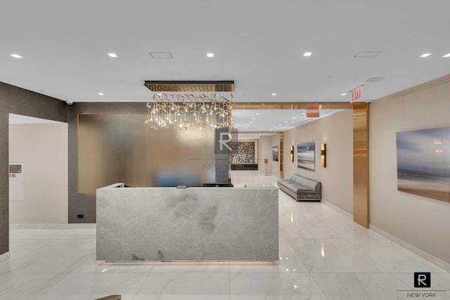 reception area featuring recessed lighting and a community bar