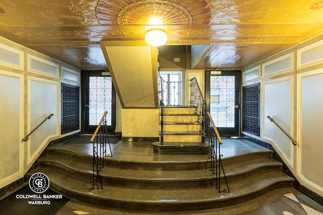 226 E 12th St Unit 1F, New York City, NY 10003 - stairway with a decorative wall and baseboards