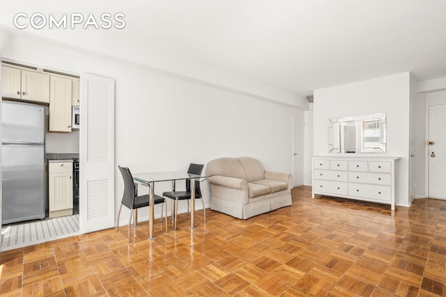 310 E 49th St Unit 7B, New York City, NY 10017 - living area with baseboards