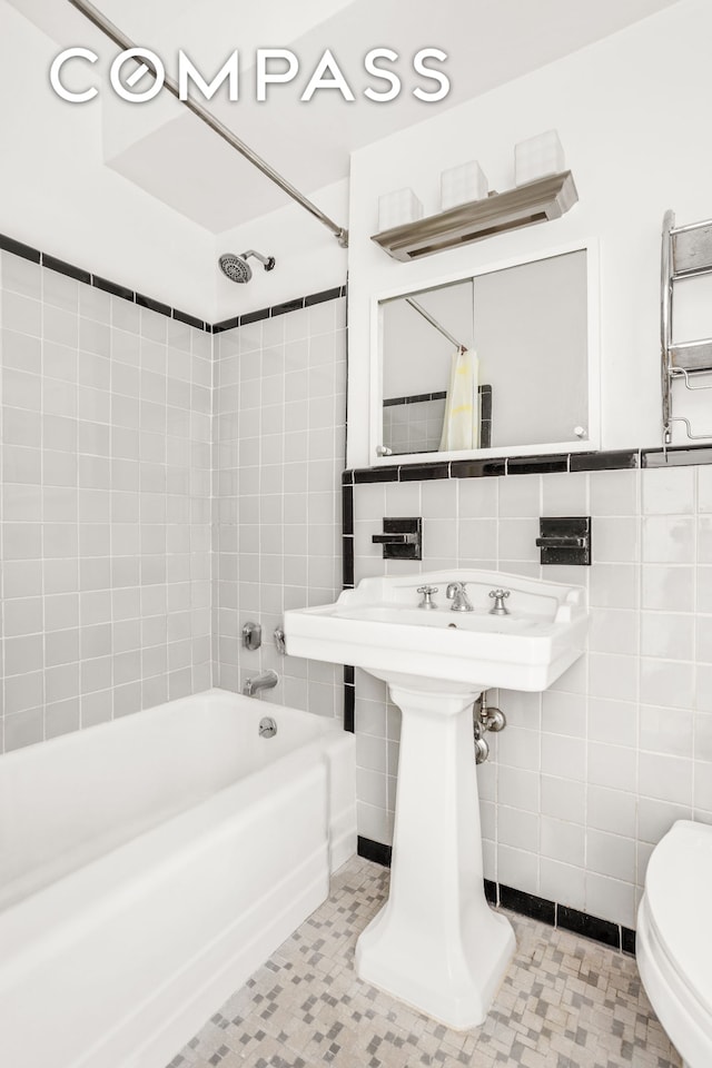 310 E 49th St Unit 7B, New York City, NY 10017 - full bath with shower / bathtub combination with curtain and tile walls