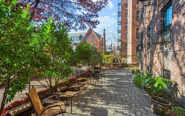35-06 88th St Unit 5-D, New York City, NY 11414 - view of community featuring a patio