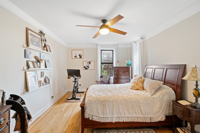 35-06 88th St Unit 5-D, New York City, NY 11414 - bedroom with ornamental molding, wood finished floors, baseboards, and ceiling fan