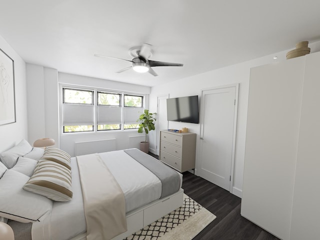 bedroom with dark wood-type flooring and ceiling fan