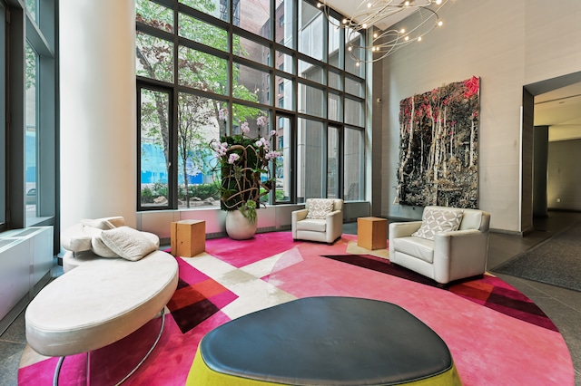 building lobby featuring a towering ceiling