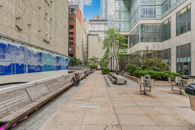 surrounding community with a city view