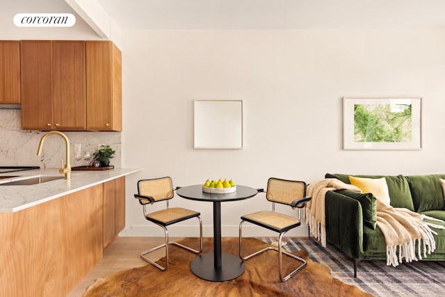 dining room with light wood-style flooring