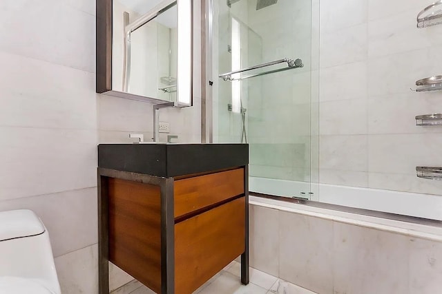 75 Wall St Unit 18Fg, New York City, NY 10005 - full bath featuring a shower with door, vanity, and toilet