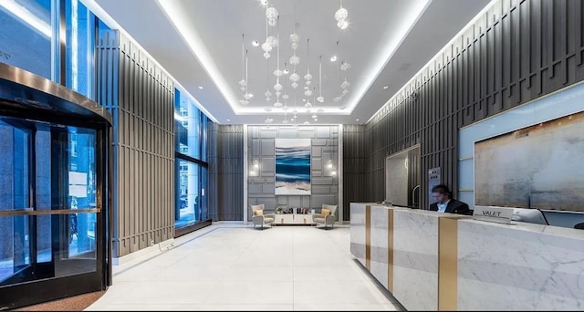 75 Wall St Unit 18Fg, New York City, NY 10005 - reception area with a towering ceiling