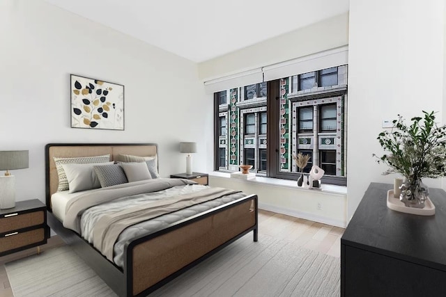 75 Wall St Unit 18Fg, New York City, NY 10005 - bedroom featuring wood finished floors