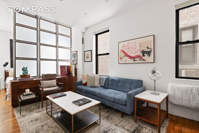 360 W 21st St Unit 2L, New York City, NY 10011 - living room featuring wood finished floors