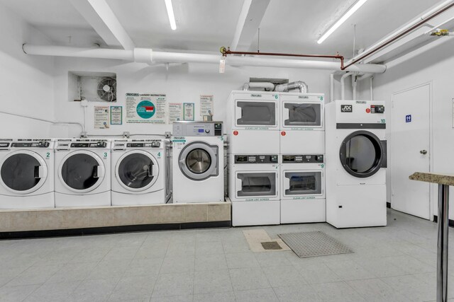 88-01 35th Ave Unit 5F, New York City, NY 11372 - shared laundry room with washing machine and dryer and stacked washer / drying machine