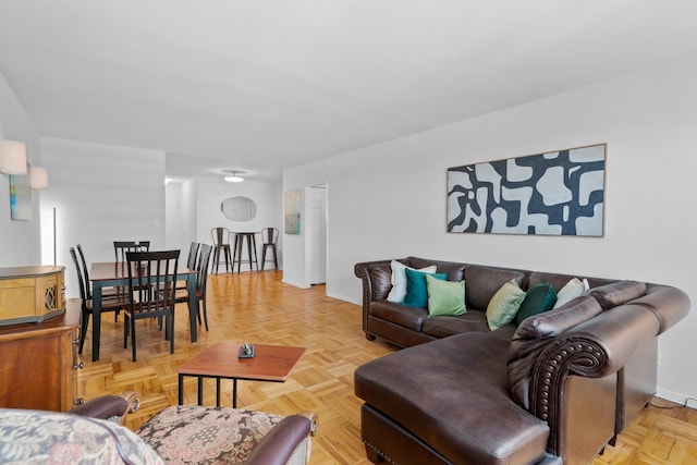 living room featuring baseboards
