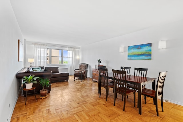 dining space with baseboards