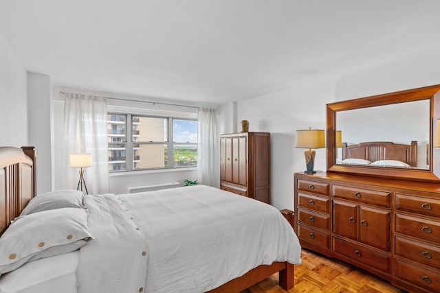 bedroom with a wall mounted AC