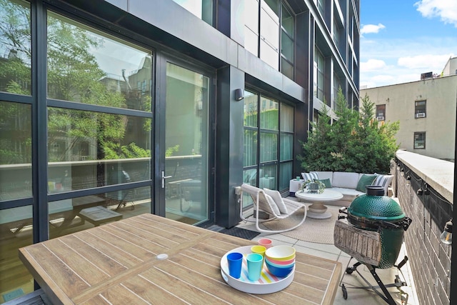 balcony featuring outdoor lounge area