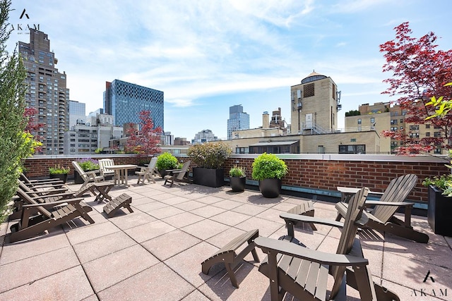 view of patio with a view of skyline