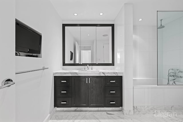 full bath with marble finish floors, vanity, a combined bath / shower with rainfall shower, and recessed lighting