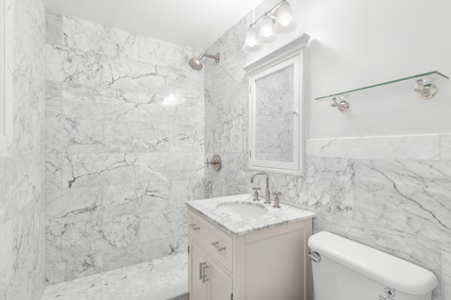 625 Main St Unit 834, New York City, NY 10044 - bathroom featuring vanity, a tile shower, and toilet