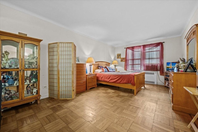 bedroom featuring radiator heating unit