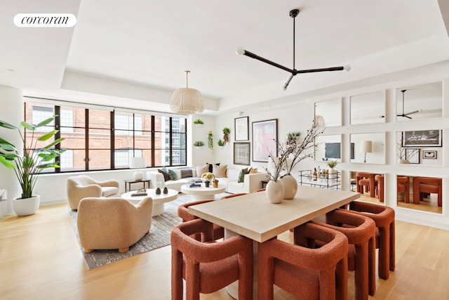 550 W 29th St Unit 9Afl, New York City, NY 10001 - dining space with a raised ceiling and light wood finished floors