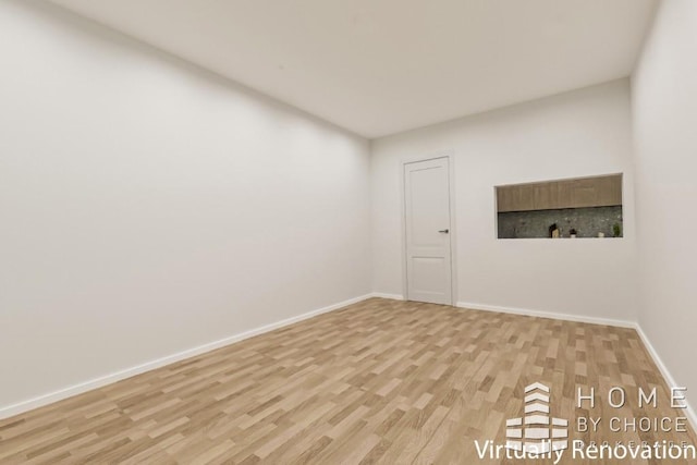 415 E 80th St Unit 3E, New York City, NY 10075 - spare room with light wood-style floors and baseboards