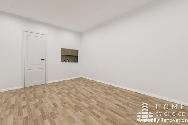 415 E 80th St Unit 3E, New York City, NY 10075 - spare room with wood finished floors and baseboards