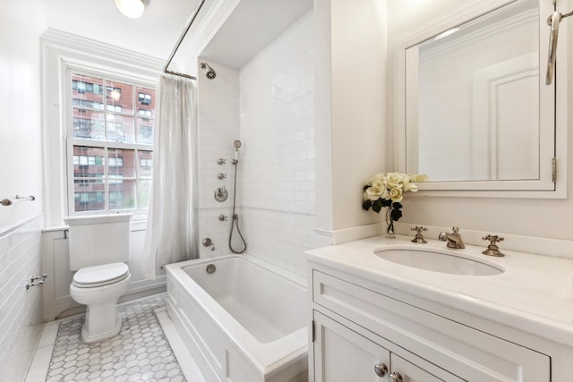 1035 Park Ave Unit 6B, New York City, NY 10028 - full bathroom featuring toilet, shower / bath combo, vanity, tile patterned flooring, and wainscoting