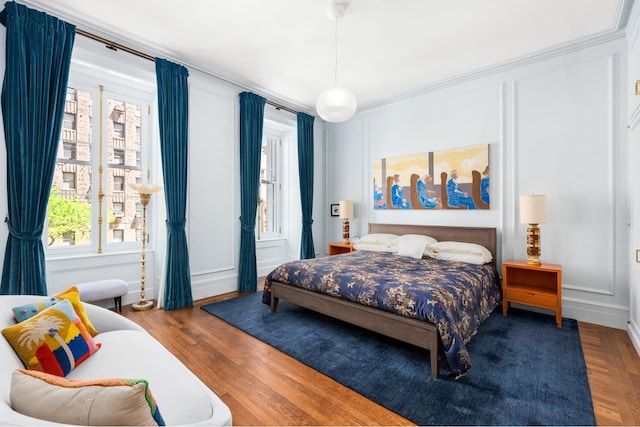 390 W End Ave Unit 2H, New York City, NY 10024 - bedroom featuring multiple windows and wood finished floors