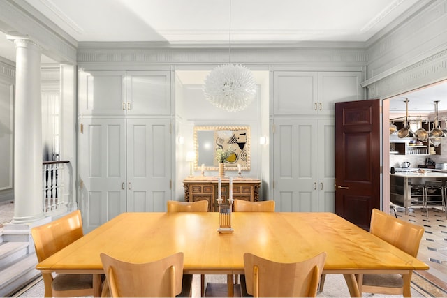 390 W End Ave Unit 2H, New York City, NY 10024 - dining space featuring ornamental molding, a chandelier, and decorative columns