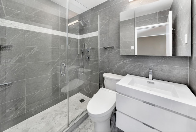 343 E 74th St Unit Ph2A, New York City, NY 10021 - full bathroom featuring tile walls, a shower stall, vanity, and marble finish floors