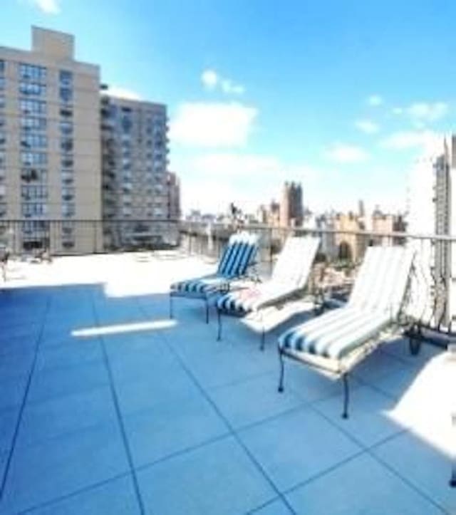 343 E 74th St Unit Ph2A, New York City, NY 10021 - view of patio / terrace with a view of city