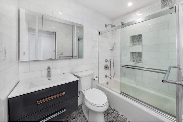 343 E 74th St Unit Ph2A, New York City, NY 10021 - full bath with vanity, enclosed tub / shower combo, tile walls, tile patterned floors, and tasteful backsplash